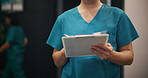 Person, nurse and hands writing with clipboard for healthcare insurance, application or patient record at hospital. Japanese, closeup or medical worker with notes, filling form or health survey