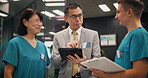 Clinic, nurses or health manager with tablet in meeting for staff management or healthcare service delivery. Medical admin, mature person or team with digital checklist for hospital schedule in Japan