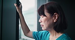 Frustrated woman, nurse and mistake with window for loss, disbelief or grief in fatigue or depression at hospital. Japanese, female person or doctor with bad news for negative results, fail or stress