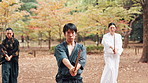 Aikido, sword and teaching with people in forest for martial arts exercise, practice or training. Bamboo, instructor and weapon with serious Japanese Samurai group in nature for kendo or self defense