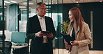 Business people, tablet and mentor in office for feedback, planning or collaboration with employee. Teamwork, Japan and discussion in workplace for insight, project management or development proposal