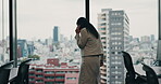 Phone call, frustrated and business woman in Japan office for company bankruptcy, fraud and crisis management. Bad news, communication and networking with back of employee for disaster and contact