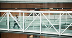 Bridge, walking and business, people with conversation, planning and start day. Japan, travel and employees in city, teamwork and commute with deadline, cooperation and discussion for project