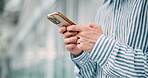 Hands, typing and businessman with phone in office for networking, check email and text message in Japan. Mobile, closeup and worker on internet for chat app, forum or salesman review budget online