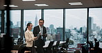 Walking, discussion and business people in office with tablet, paperwork or schedule planning. Leadership, Japanese businessman and woman at agency with advice, digital app and online agenda report