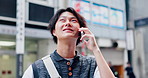 Happy Asian man, phone call and talking in city, travel and listen to contact for information. Japanese person, outdoor and mobile conversation for communication, news update and connection for story