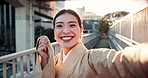 Happy, asian woman and selfie with kimono in city for fashion, travel or style in an urban town. Portrait, japanese or female person with smile for picture, photography or clothing tradition in Japan