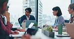 Laptop, teamwork and business, people in meeting, conversation or feedback for project. Japan, employees or group in boardroom, computer or review proposal with stock market, investment or accounting