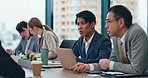 Planning, laptop and business, people in meeting, teamwork and feedback for project. Japan, employees or group in boardroom, discussion or corporate professional with stock market, talk or accounting