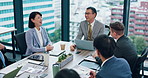 Funny, laptop and business, people in meeting, conversation and feedback for project. Japan, employees and group in boardroom, joke or humor with stock market, laughing or accounting with teamwork