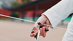 Archery, bow and arrow with hands in Japan for shooting game, challenge and target practice. Competition, training and draw weapon with sports gear and person closeup for score, aim or bullseye