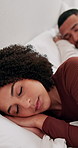 Couple, relax and sleeping with bed for rest, comfort or peaceful morning together at home. Man, woman or tired lovers asleep with pillow in sheets or bedroom for snooze, nap or slumber at house