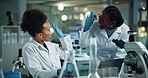 Science, women and high five in lab with microscope, cheers and medical research for pharmaceutical project. People, partnership and goals with success, coach and breakthrough for vaccine development