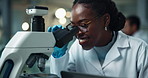 Scientist, black woman and microscope with smile for chemistry, experiment and medical research. Chemical analysis, expert and happy with liquid inspection for pharmaceutical study report success