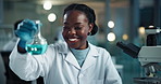 Scientist, black woman and chemical in beaker with smile for chemistry, experiment and medical research. Microscope, analysis and expert with liquid inspection for pharmaceutical study success
