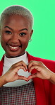 African woman, green screen and face with heart hands for care, wellness and love on valentines day. Female person, portrait and happiness for health, emoji and positive attitude on studio background