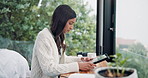 Woman, home office and tablet with typing, serious and concentration for research or conversation. Female person, texting and scroll on tech as communication, email and internet for social networking