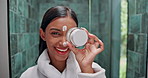 Beauty, woman and cream on face in bathroom for hydration, moisturizing lotion and skin protection. Laughing, portrait and skincare product with funny self care routine, dermatology and happy in home