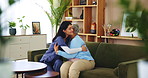 Elderly care, nurse and old woman on couch with hug, support or comfort in lounge at nursing home. Homecare, senior person and happy caregiver on sofa with healthcare, smile or embrace in living room