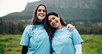 Women, volunteers and face for hug in nature, nonprofit collaboration and outdoor for social project. People, portrait and community service for sustainable charity, cleaning forest and helping