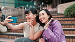 Selfie, friends and city steps with women, fun and social media with smile outdoor. Internet, happy and holiday in Japan on stairs and website in Tokyo with silly hand sign and bonding together