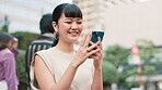 Professional, woman and laughing with smartphone in city for funny text message, social media meme or feedback. Japanese person, phone and happy outdoor for mobile chat, internet joke or dating site