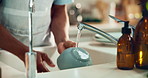 Hands, washing dishes and kitchen sink for housekeeping, hygiene or household chores with care. Person, water and rinse as cleaner in home for health, germs and bacteria prevention as spring cleaning