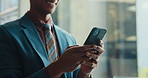 Hands, phone and typing in office, attorney and person with notification, contact and online for legal consulting. Lawyer, advocate and smartphone for networking, smile and app at corporate law firm