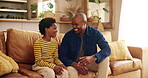 Love, smile or talking with father and son on sofa in living room of home together as black family. Advice, bonding or conversation with single parent man and boy child in apartment for discussion