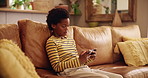 Sofa, boy and black child with phone for games, connection or streaming cartoon movies in home. Entertainment, relax or kid gaming on couch with mobile for watching video, playing online or addiction