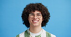 Studio, face and man with spectacles for eye care, wellness and prescription for vision with happiness. Blue background, male person and laughing in portrait with glasses, optical health and mockup