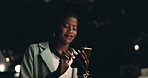 Black woman, city and phone outdoor with mobile, social media and web search with travel. Taxi app, internet and online with location share for safety in the dark with email and traffic check