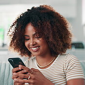 Woman, happy and phone on sofa for social media, funny message and ...