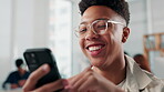 Man, designer and happy in office with phone, connectivity and funny social media. Creative intern, laugh and mobile in agency for online marketing, fun campaign and pleased with app for networking