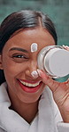 Beauty, skincare and face with woman and cream in bathroom for dermatology, glow or cosmetics. Shine, makeup and collagen lotion with person at home with facial routine for self care, spa or cleaning