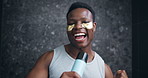 Eye mask, face and sing with black man in bathroom of home for dermatology or skincare routine. Dance, energy and portrait of happy African person on dark background for antiaging beauty or cosmetics