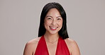 Happy, studio and face of woman, laughing and red dress for date, confident and smile for anniversary. Mockup space, grey background and elegant for valentines day, fashion and stylish in Japan