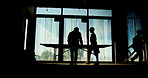 Architecture, building and silhouette of engineer people on site for property development. Collaboration, industrial and infrastructure with construction worker team in office for project management