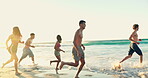 Holiday, friends and running in water at beach for travel adventure, summer vacation and fun on weekend trip. Freedom, diversity people and enjoyment by ocean with bonding, energy or explore together