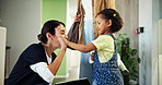 Dentist, high five and greeting with girl, reception and appointment for checkup. Child healthcare, smile and welcome with kid for dental care, oral hygiene and teeth cleaning service in clinic