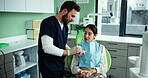 Consulting, model and mouth with woman at dentist for advice, teeth cleaning and healthcare. Orthodontics, medical and dental implant with person in clinic for patient checkup, gum care and exam