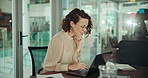 Laptop, solution and thinking with designer woman in office for programming or troubleshooting. Computer, problem solving and web development with creative employee in workplace for software coding