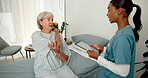 Talking, shoulder pain and nurse with tablet, healthcare and checkup for diagnosis and senior care. Medical professional, caregiver and consultation for elderly patient, people and recovery in clinic