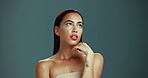 Woman, natural beauty and soft skin texture with wellness, health and glow from skincare routine. Studio, cosmetics and confidence with facial, glow and results from treatment and green background
