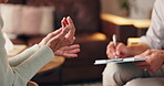 Consultation, therapist and patient with hands for discussion, writing or recovery support for mental health. Therapy, psychologist and senior person in counseling for share trauma, progress or notes