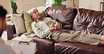 Counseling, therapist and mature woman on couch for professional care, consultation and advice. Mental health, psychologist and patient on sofa in office with discussion, support and therapy notes