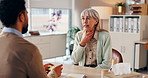 Senior woman, doctor and consulting with throat pain, virus or infection for swollen lymph nodes at hospital. Elderly, female person or patient talking to healthcare worker for health consultation