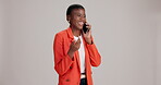 Phone call, conversation and black woman with laugh, smile and talking in studio. Funny meme, networking and girl with smartphone in communication, discussion and chatting online on grey background