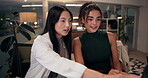 Women, employee and explain on computer for project deadline, feedback and report as graphic designer. Business people, night an meeting or discussion at office with teamwork and collaboration