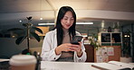 App development, phone and smile with business woman in office at night for communication or social media. Contact, networking and text message with designer person in workplace for mobile software